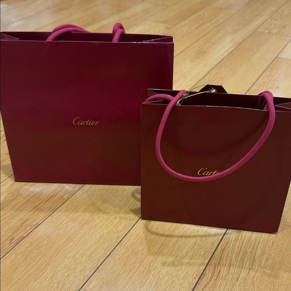 Cartier Handbags - Cartier Burgundy Tote Gift Bags with Gold Logo price for both 10x9 & 8x7